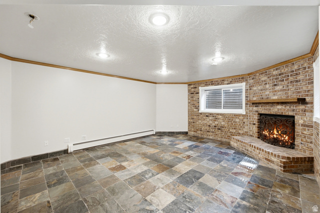 3535 Homestead Road Park City, UT 84098 - Photo 48 of 81 Spacious room featuring a corner brick fireplace with a decorative screen