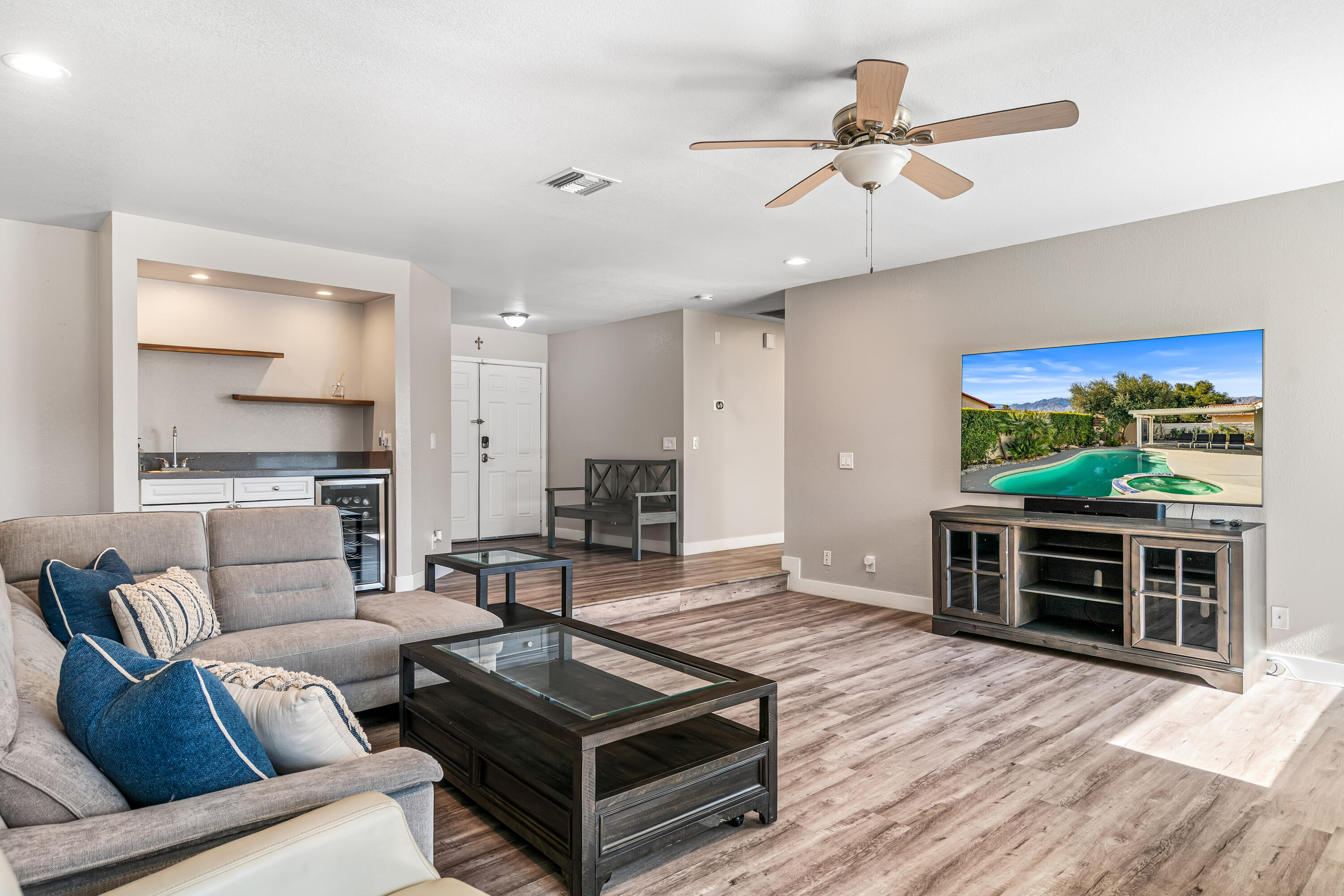 67265 Rango Road Cathedral City, CA 92234 - Photo 14 of 49 a living room with furniture and a flat screen tv
