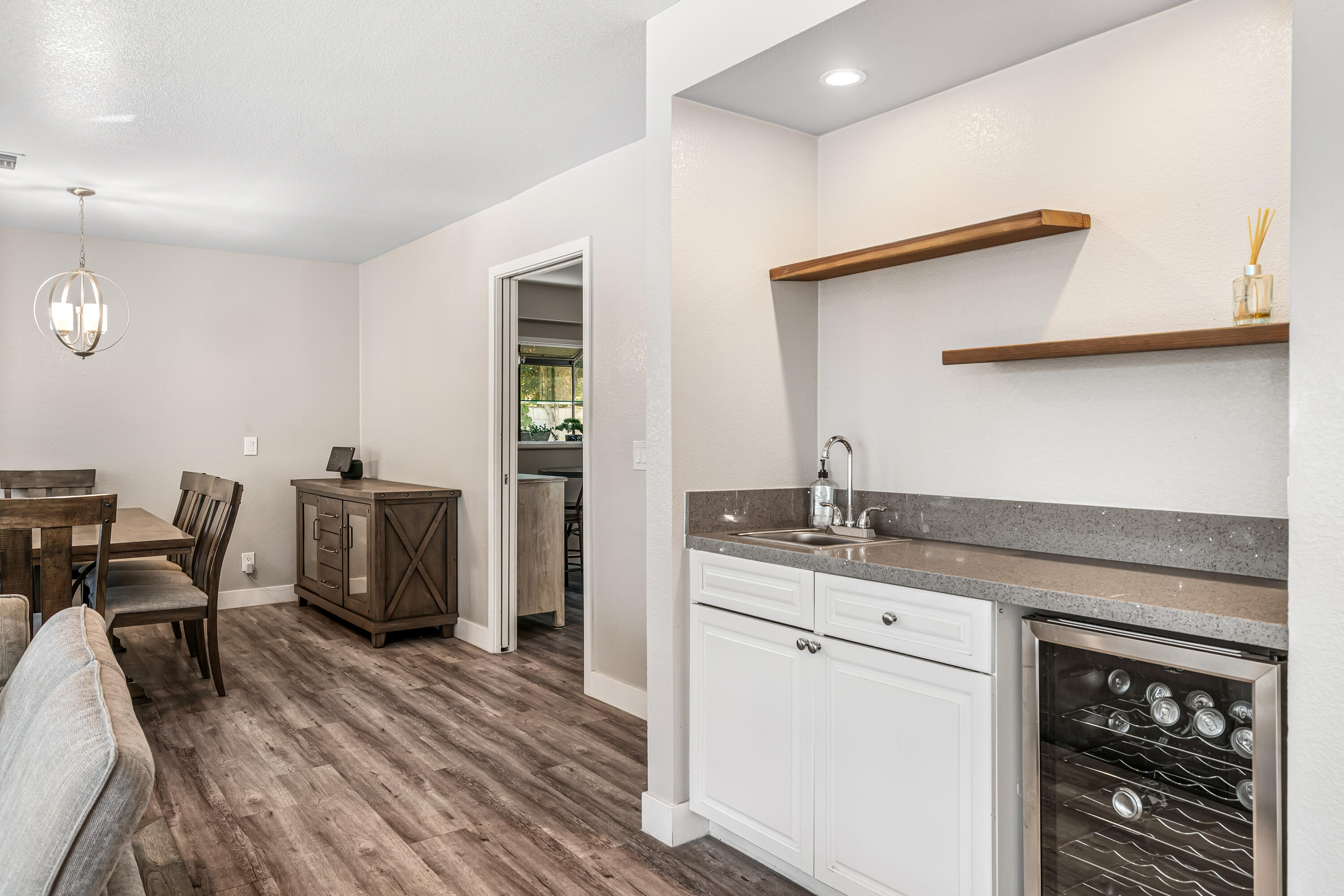 67265 Rango Road Cathedral City, CA 92234 - Photo 15 of 49 a kitchen with granite countertop a sink stove and cabinets