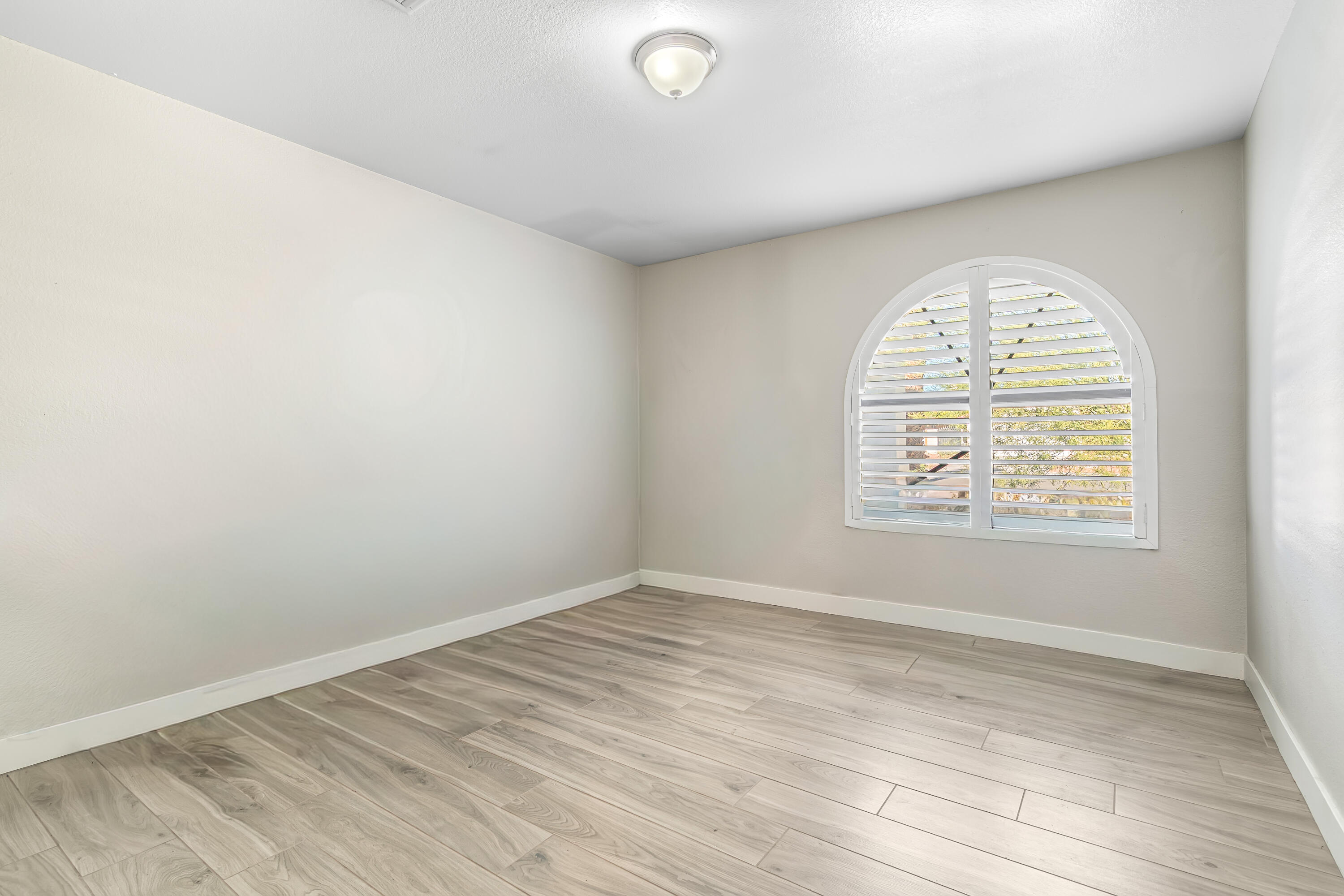 67265 Rango Road Cathedral City, CA 92234 - Photo 34 of 49 an empty room with a window