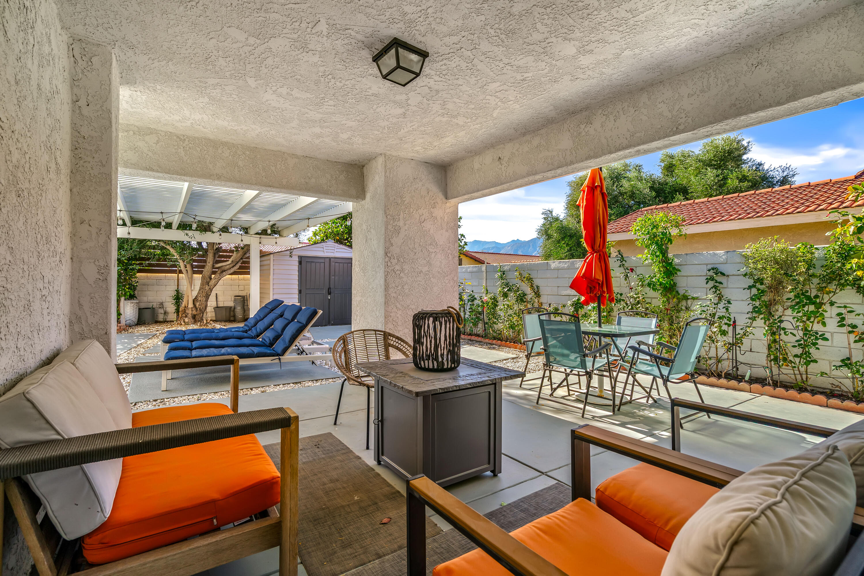 67265 Rango Road Cathedral City, CA 92234 - Photo 48 of 49 a outdoor living space with furniture and garden view