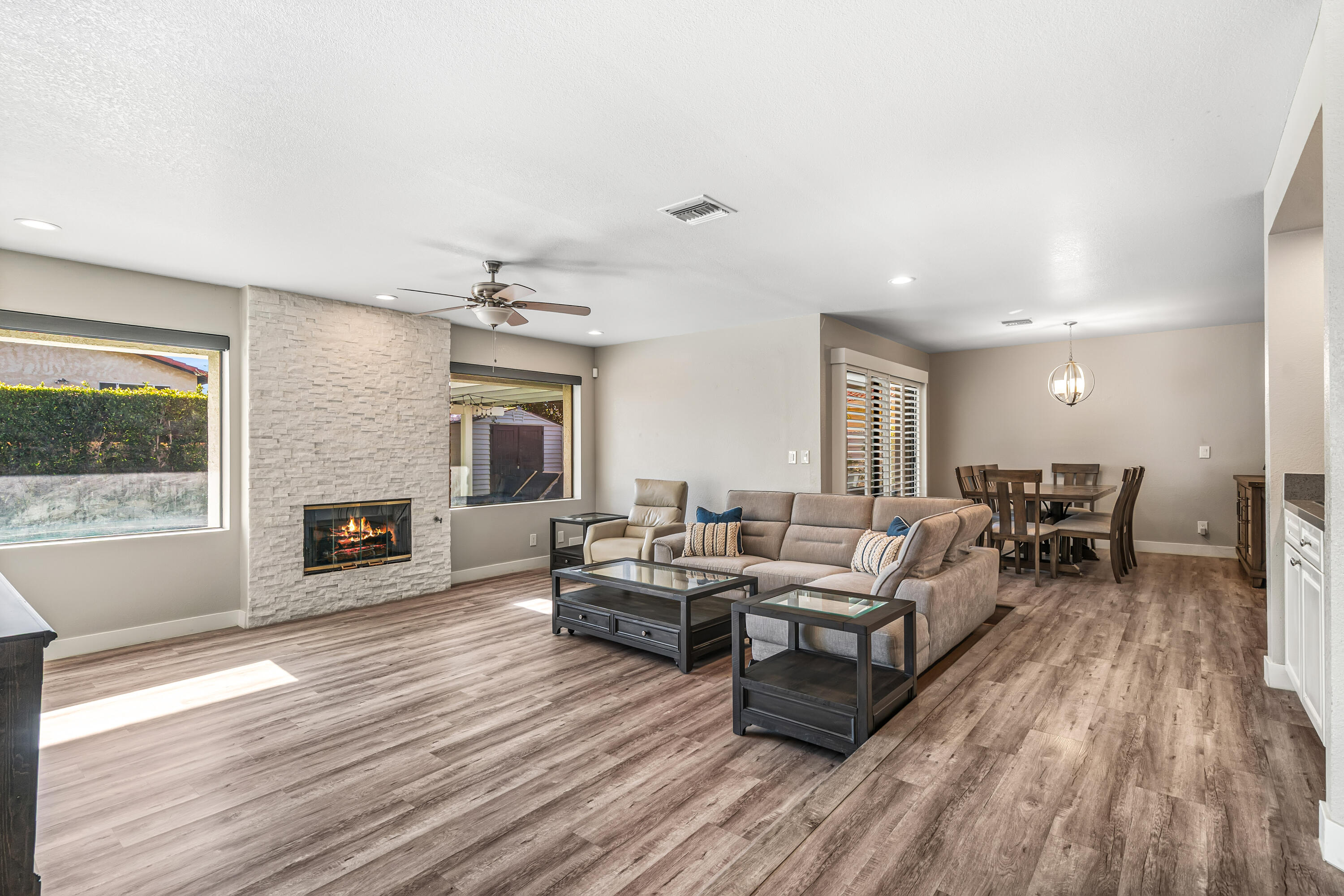 67265 Rango Road Cathedral City, CA 92234 - Photo 10 of 49 a living room with furniture and a fireplace