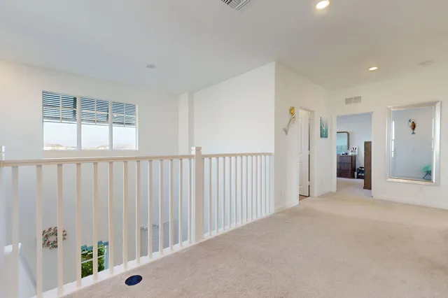 a en suite bathroom with a sink and a mirror
