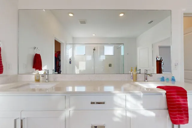 a view of a chairs and table in patio with a yard