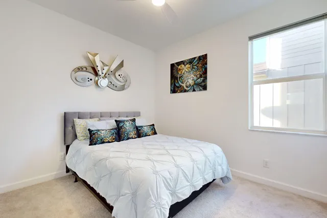 a view of swimming pool with outdoor seating