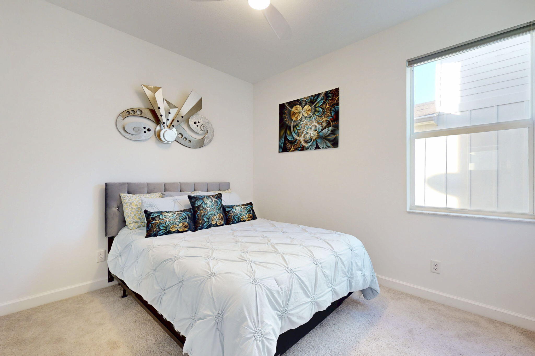 1319 Arrowhead Point Road Loxahatchee, FL 33470 - Photo 21 of 45 a bedroom with a bed and a window