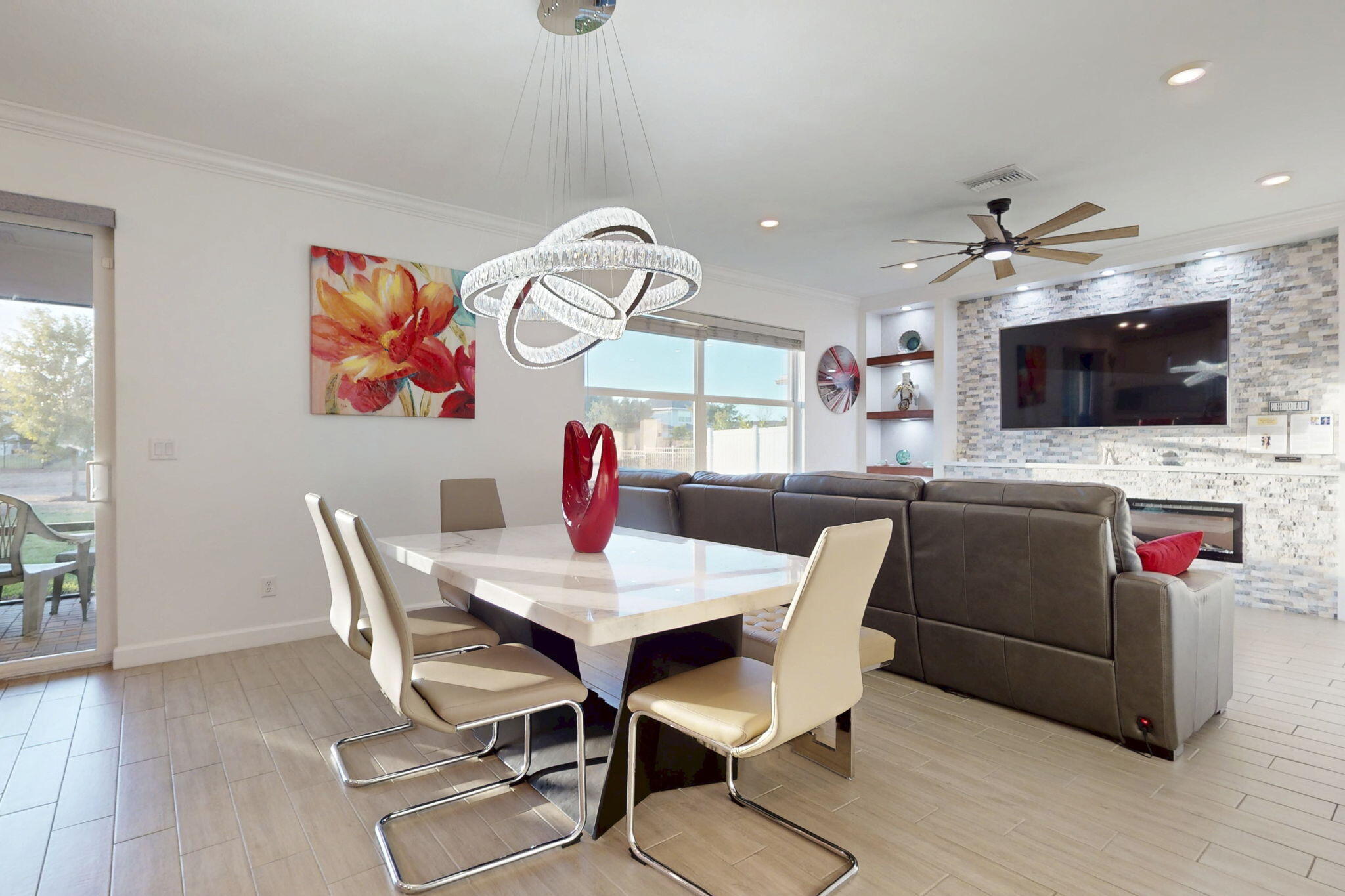1319 Arrowhead Point Road Loxahatchee, FL 33470 - Photo 4 of 45 a view of a dining room with furniture and wooden floor