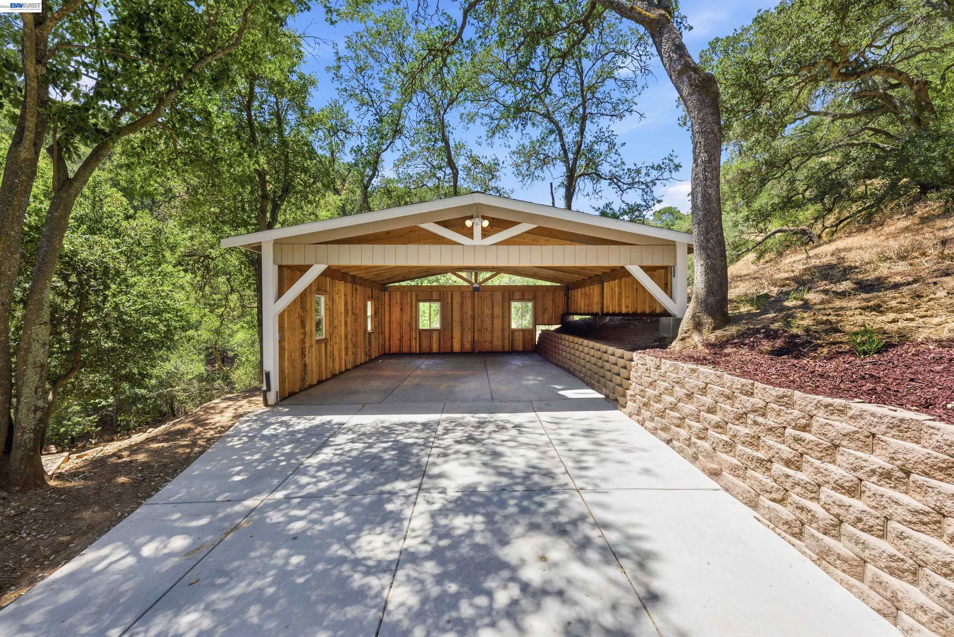 1929 Kilkare Road Sunol, CA 94586 - Photo 22 of 24 a front view of a house with a yard