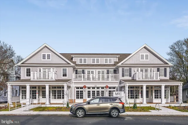 a car parked in front of a house