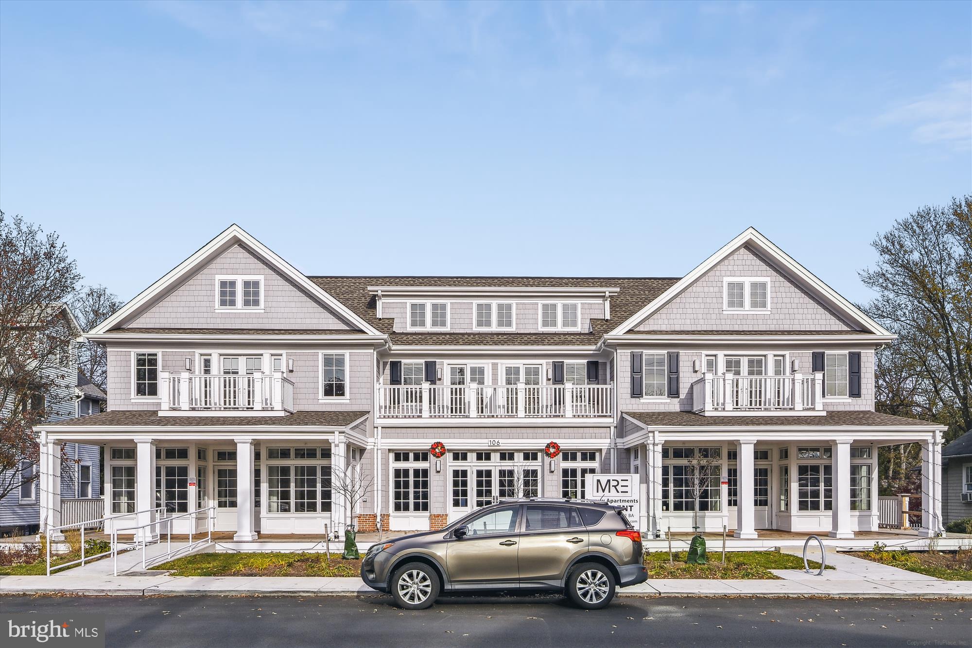 a car parked in front of a house