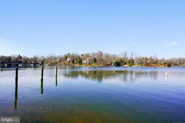 a view of a lake with a building in the background