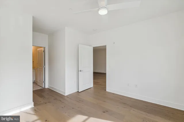 a kitchen with a sink and a refrigerator