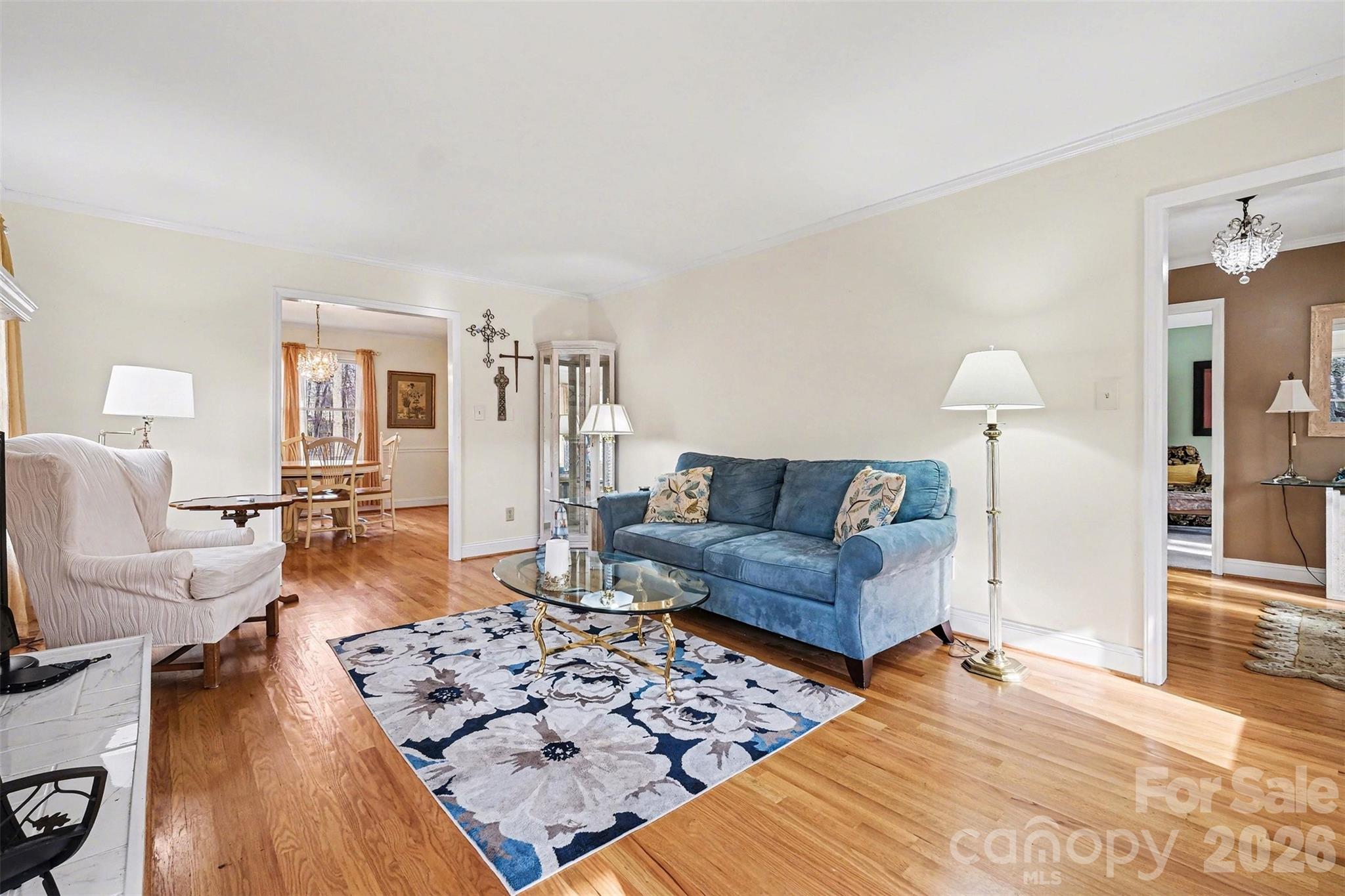 909 Woodland Forest Road Waxhaw, NC 28173 - Photo 22 of 38 a living room with furniture and wooden floor