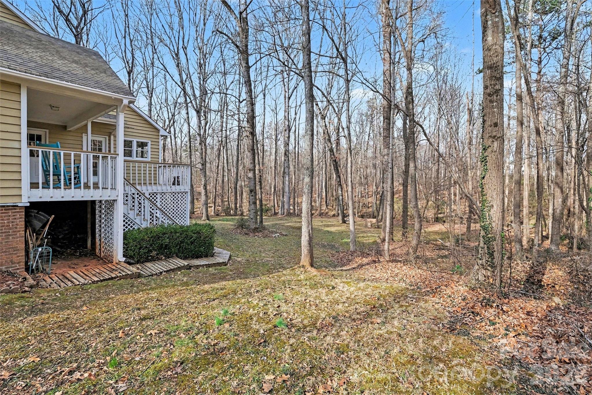 909 Woodland Forest Road Waxhaw, NC 28173 - Photo 35 of 38 a backyard of a house with seating space