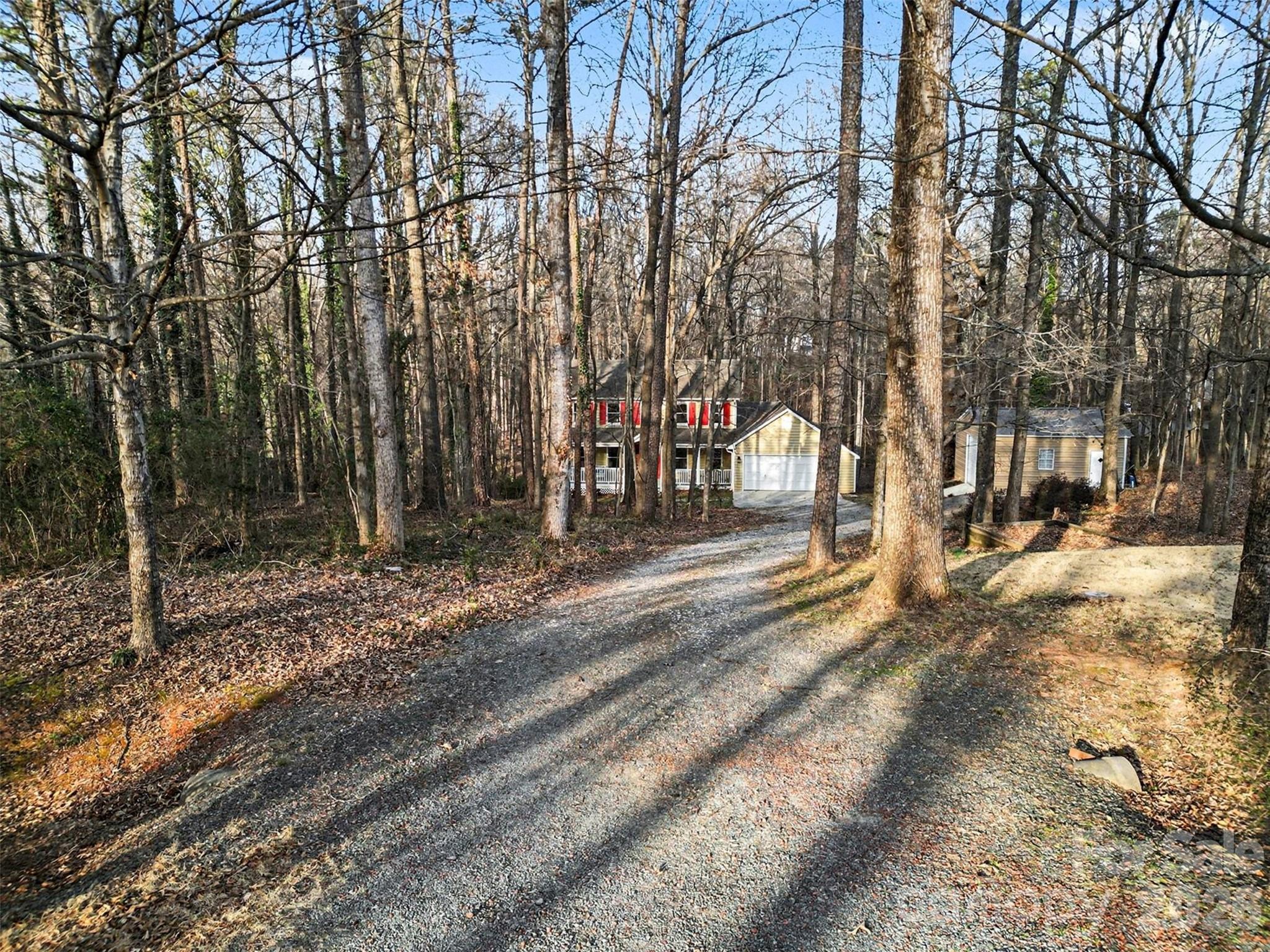 909 Woodland Forest Road Waxhaw, NC 28173 - Photo 38 of 38 a view of road with trees