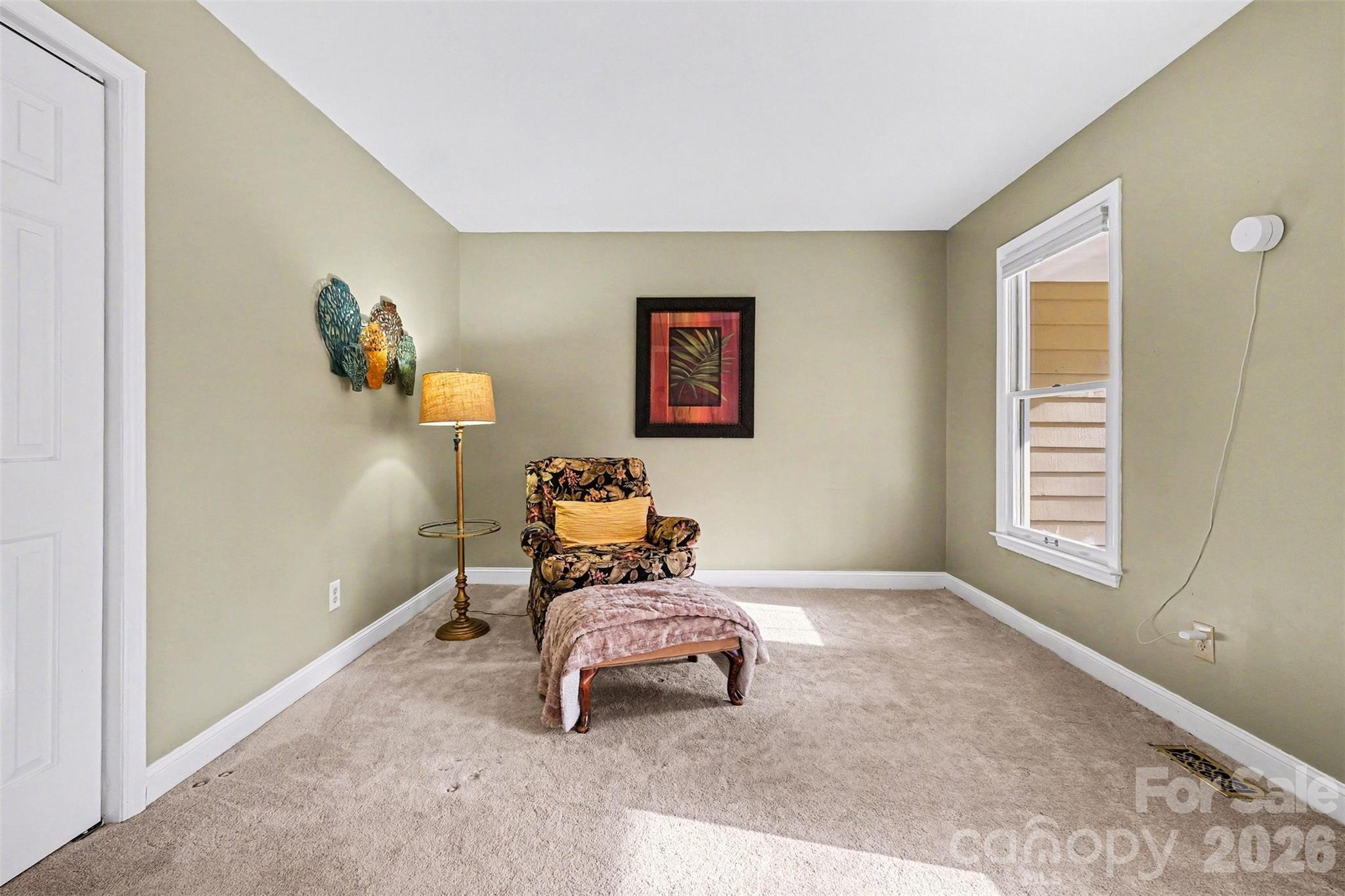 909 Woodland Forest Road Waxhaw, NC 28173 - Photo 5 of 38 a bedroom with a bed and a window