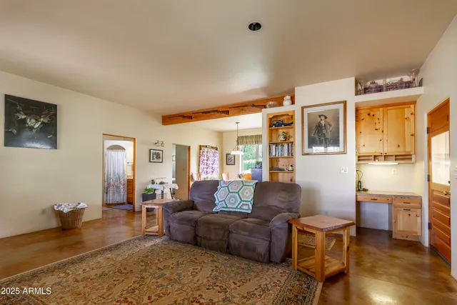 a kitchen with stainless steel appliances a stove sink and cabinets
