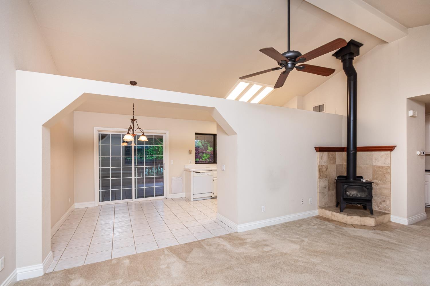 5705 Tudor Way Loomis, CA 95650 - Photo 15 of 59 an empty room with ceiling fan and window