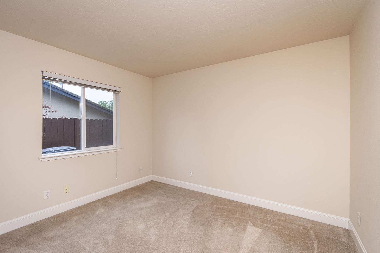 5705 Tudor Way Loomis, CA 95650 - Photo 28 of 59 an empty room with a window
