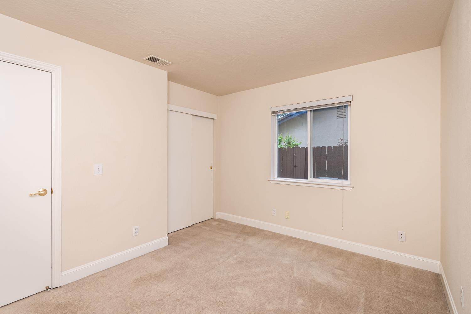 5705 Tudor Way Loomis, CA 95650 - Photo 29 of 59 a view of an empty room with a window