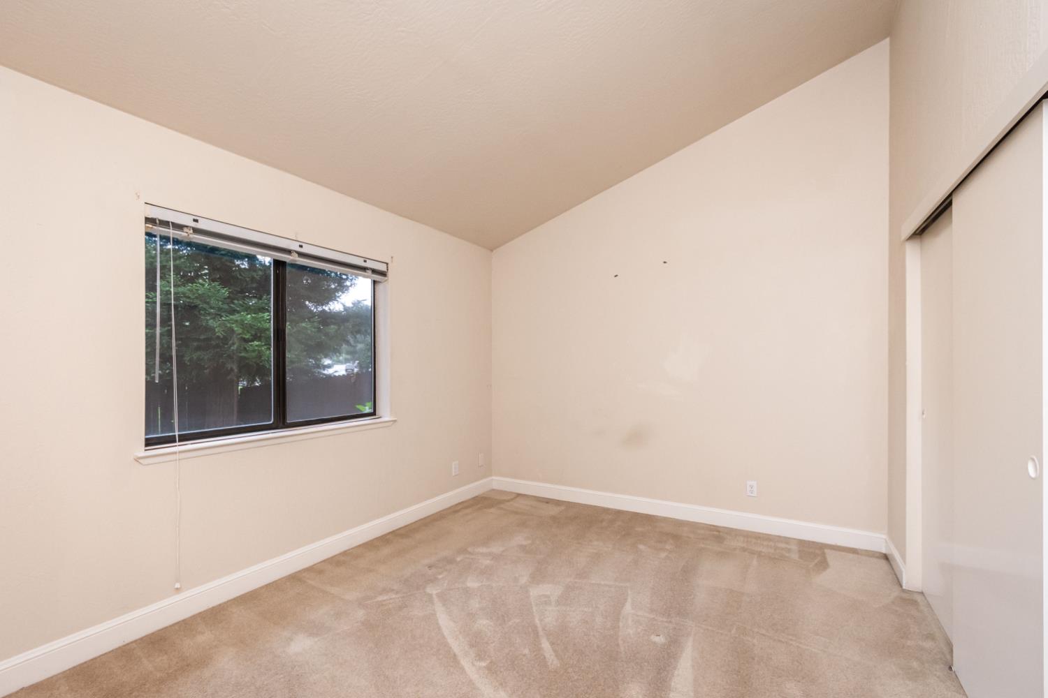 5705 Tudor Way Loomis, CA 95650 - Photo 31 of 59 a view of an empty room with a window
