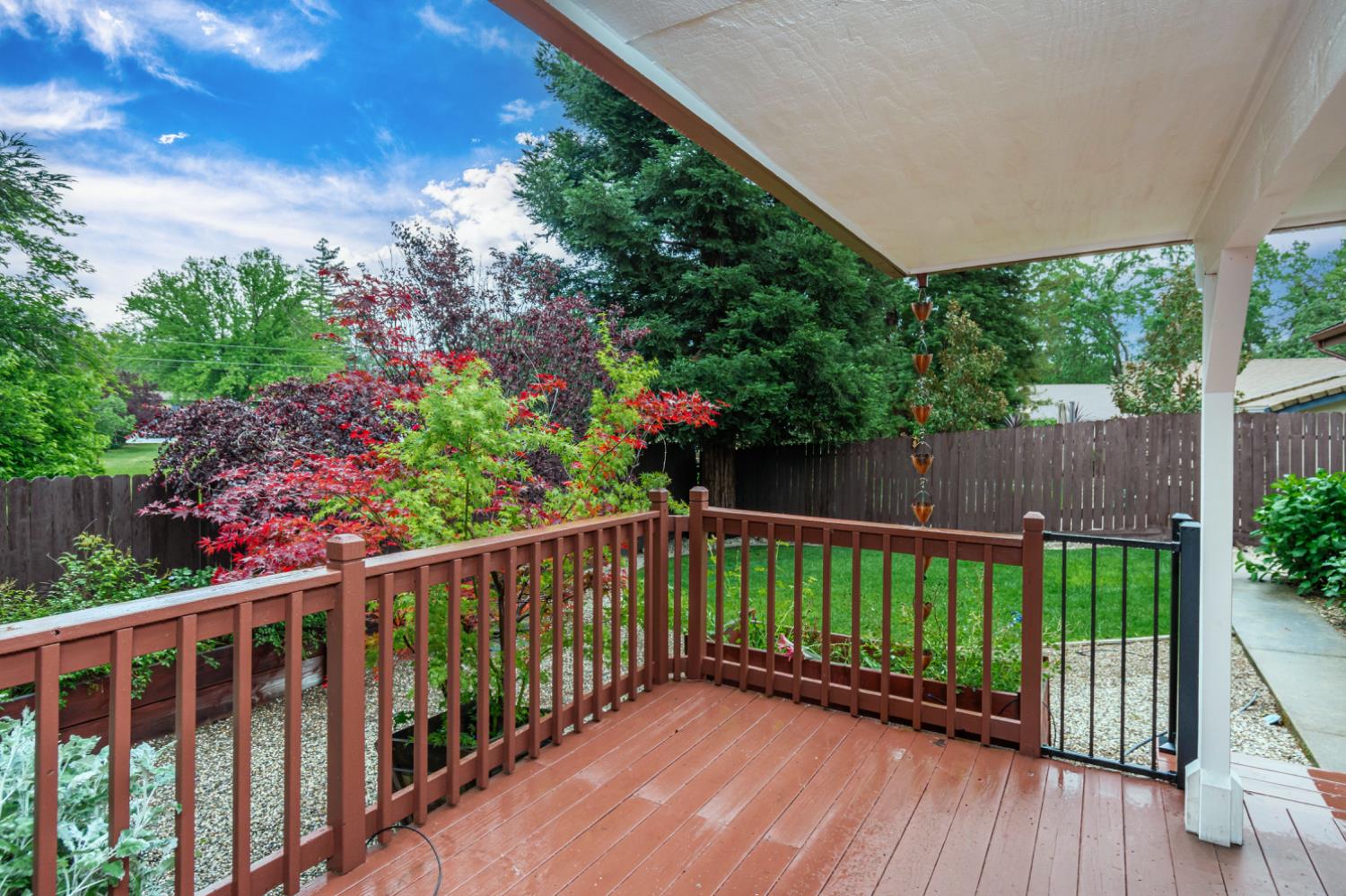 5705 Tudor Way Loomis, CA 95650 - Photo 37 of 59 a view of a wooden fence