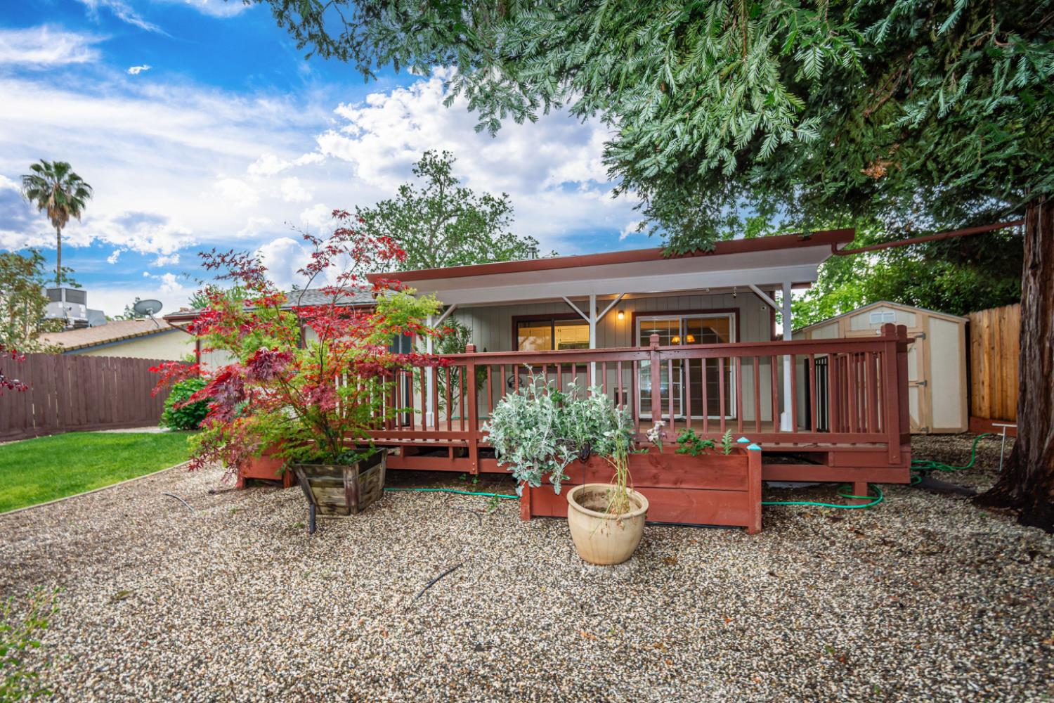 5705 Tudor Way Loomis, CA 95650 - Photo 39 of 59 a view of a house with backyard and sitting area