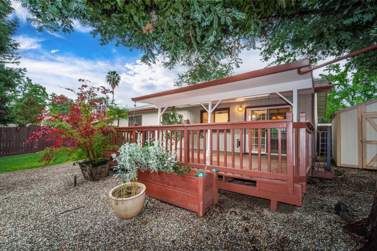 5705 Tudor Way Loomis, CA 95650 - Photo 40 of 59 a view of a house with backyard and sitting area
