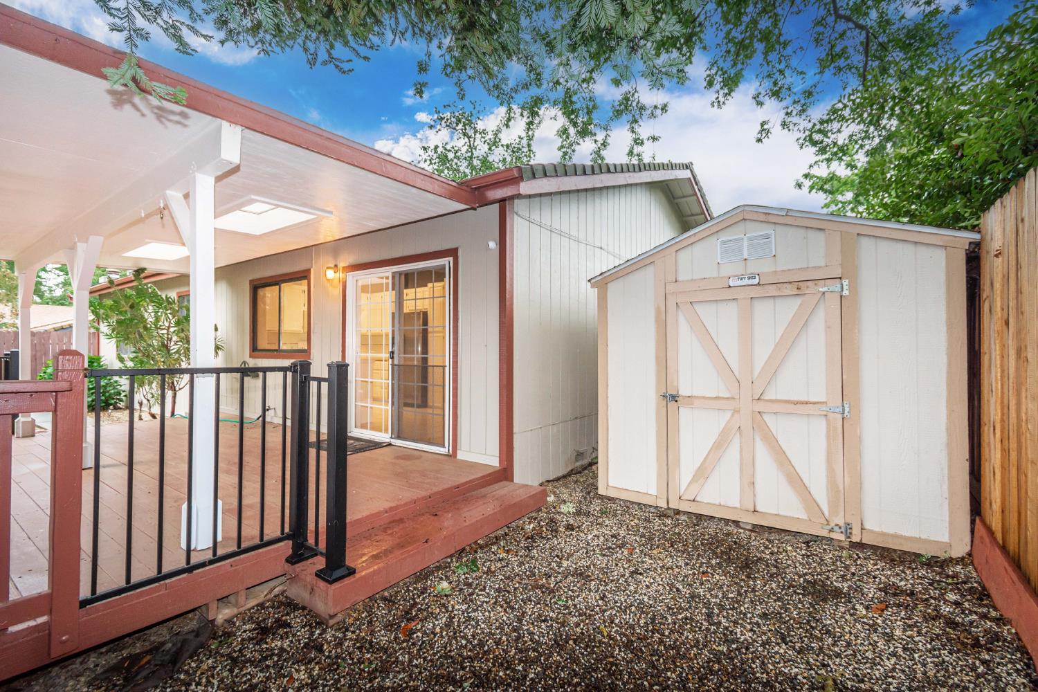 5705 Tudor Way Loomis, CA 95650 - Photo 42 of 59 a front view of a house with a garden