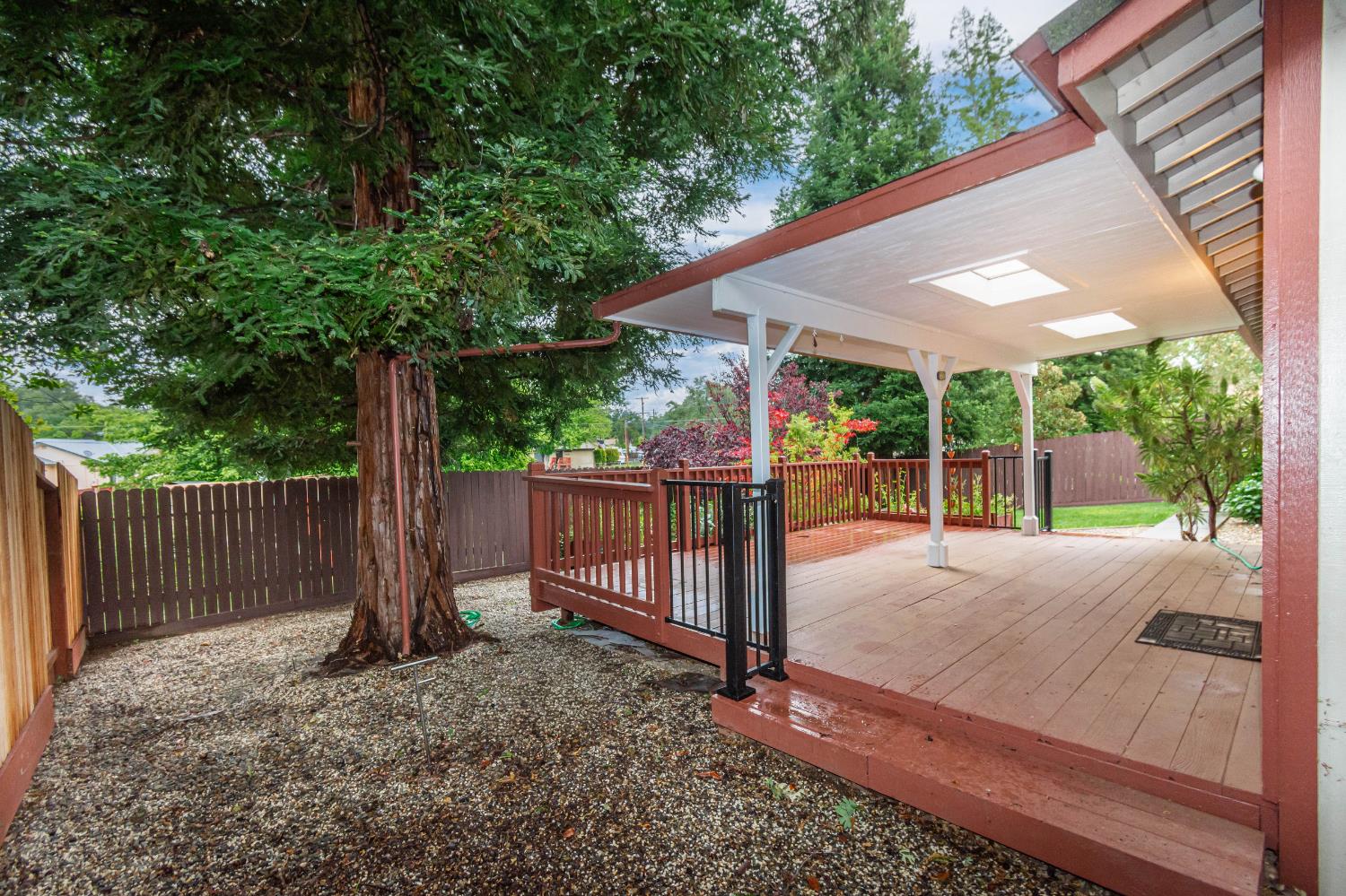 5705 Tudor Way Loomis, CA 95650 - Photo 43 of 59 a view of a backyard with a tree