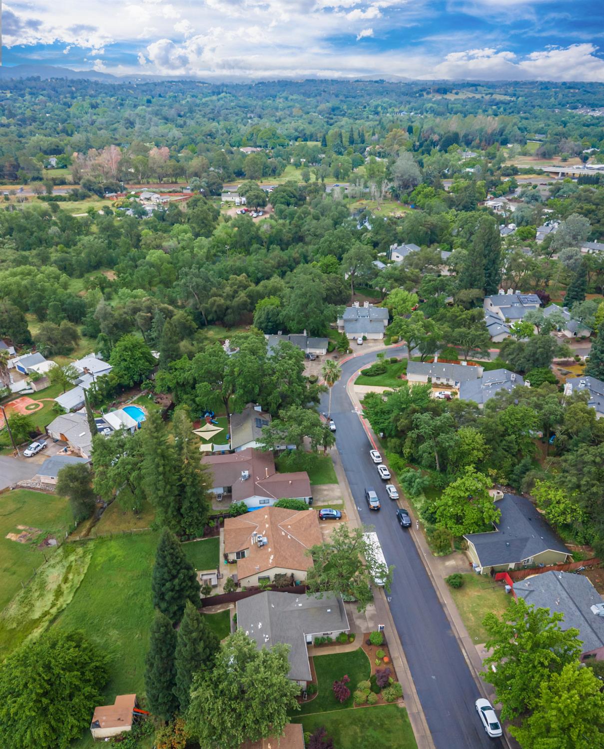 5705 Tudor Way Loomis, CA 95650 - Photo 54 of 59 an aerial view of residential houses with outdoor space and trees