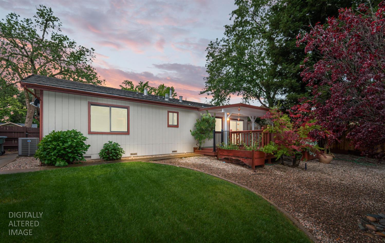 5705 Tudor Way Loomis, CA 95650 - Photo 58 of 59 a front view of a house with a garden and yard