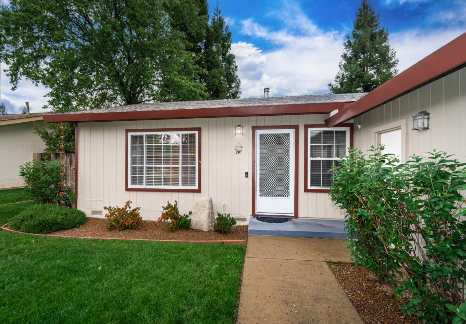 5705 Tudor Way Loomis, CA 95650 - Photo 7 of 59 a front view of a house with garden