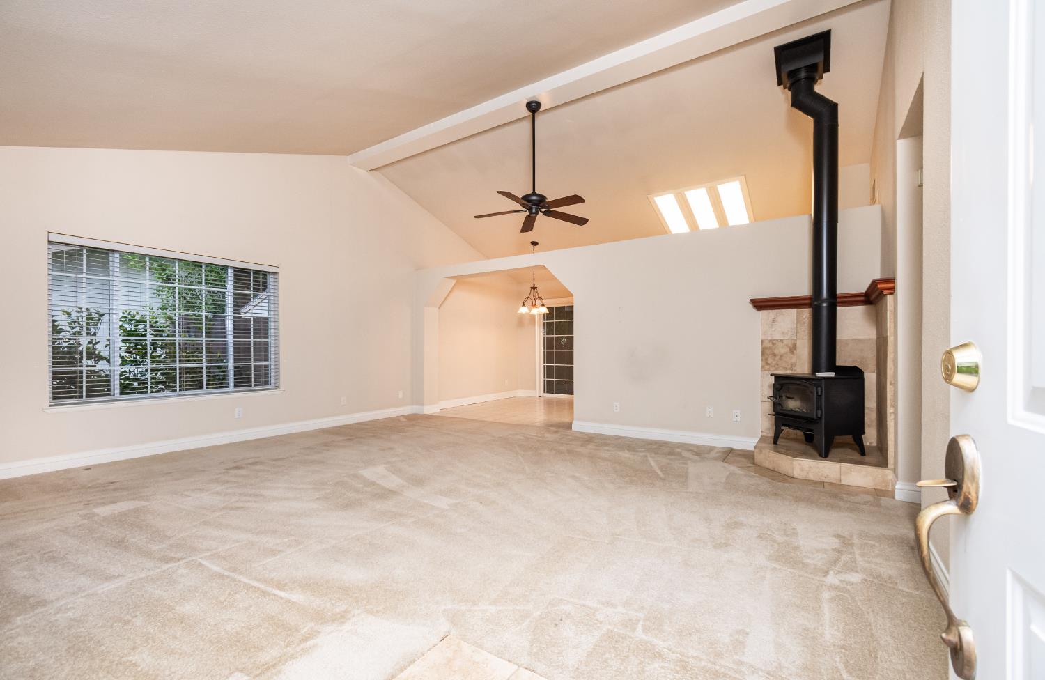 5705 Tudor Way Loomis, CA 95650 - Photo 8 of 59 a view of an empty room with a window