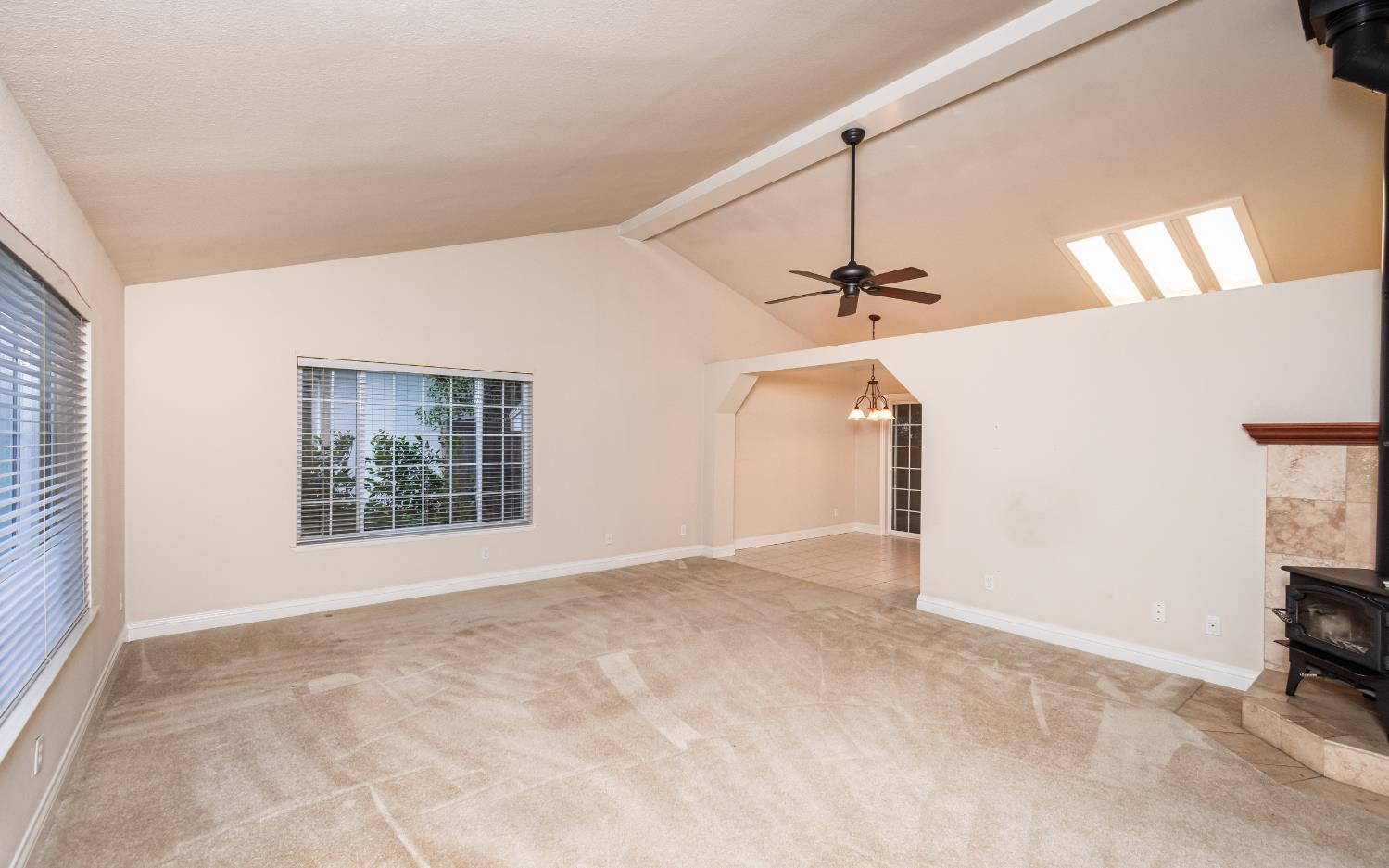 5705 Tudor Way Loomis, CA 95650 - Photo 9 of 59 a view of a room with a ceiling fan and window