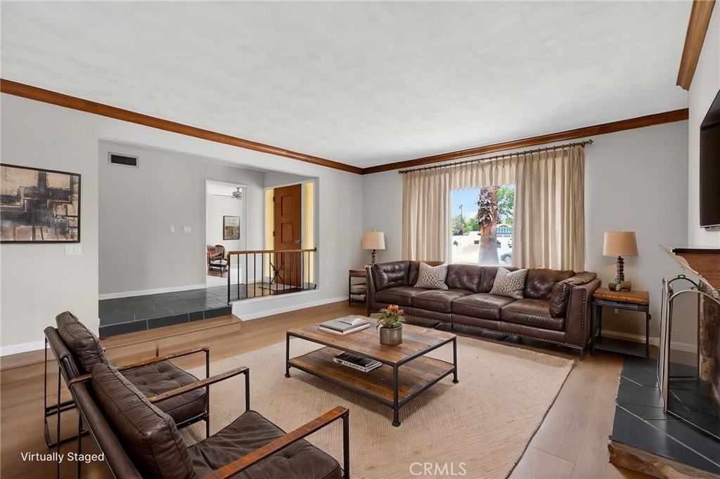 4963 Carlingford Avenue Riverside, CA 92504 - Photo 3 of 33 a living room with furniture and a window