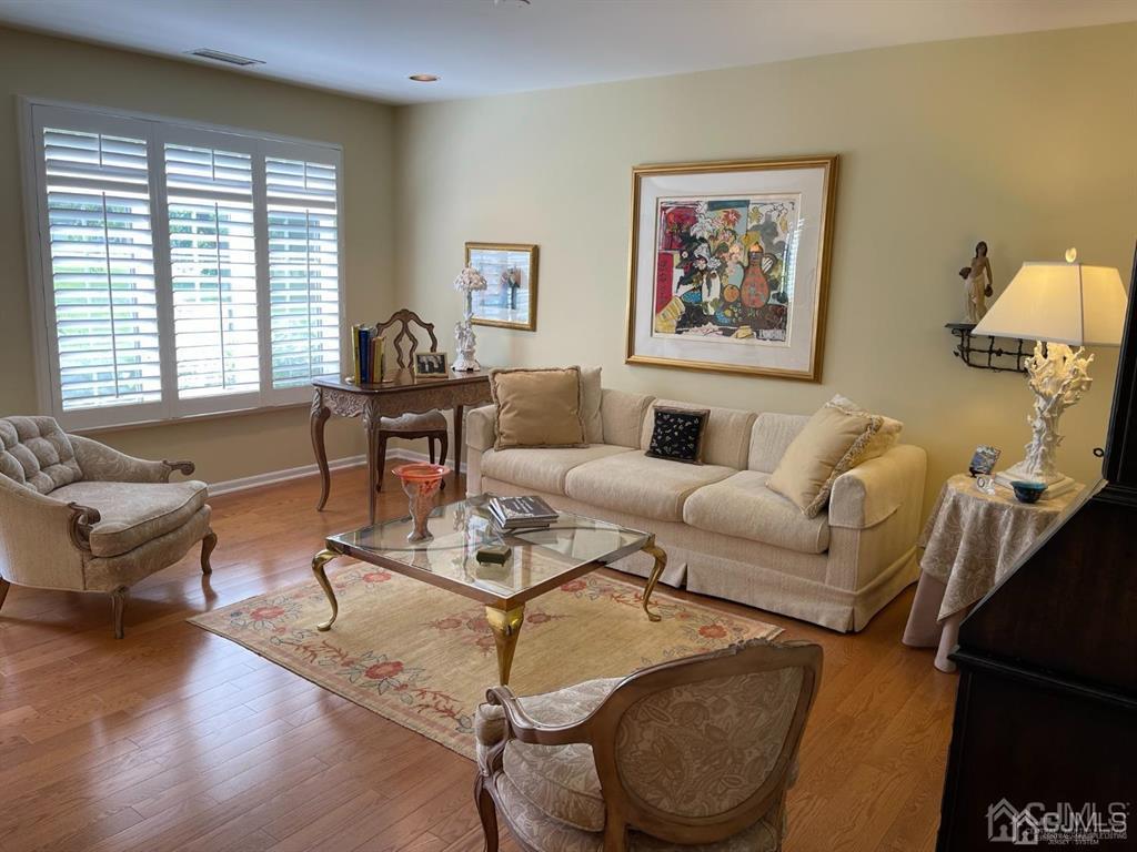 70 A Winthrop Road Monroe Township, NJ 08831 - Photo 11 of 50 a living room with furniture and a window
