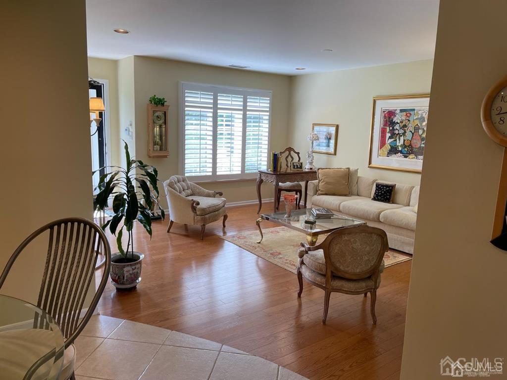 70 A Winthrop Road Monroe Township, NJ 08831 - Photo 12 of 50 a living room with furniture and a wooden floor