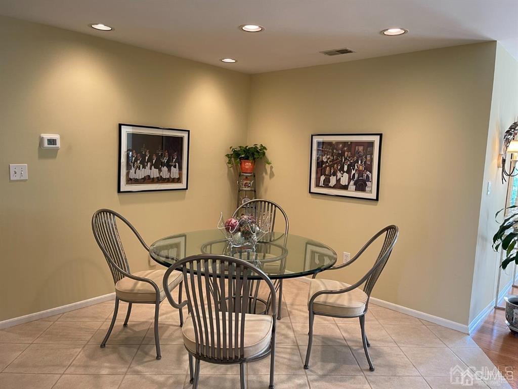70 A Winthrop Road Monroe Township, NJ 08831 - Photo 14 of 50 a dining room with furniture and wooden floor