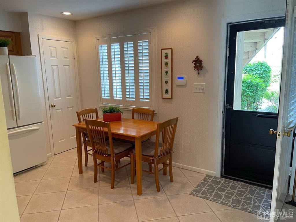 70 A Winthrop Road Monroe Township, NJ 08831 - Photo 19 of 50 a dining room with a table and chairs