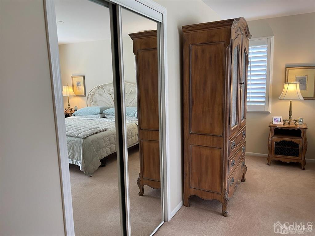 70 A Winthrop Road Monroe Township, NJ 08831 - Photo 23 of 50 a bedroom with a bed and a cabinets
