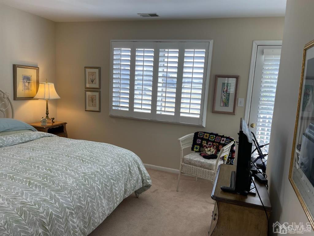 70 A Winthrop Road Monroe Township, NJ 08831 - Photo 26 of 50 a bedroom with a bed and a window