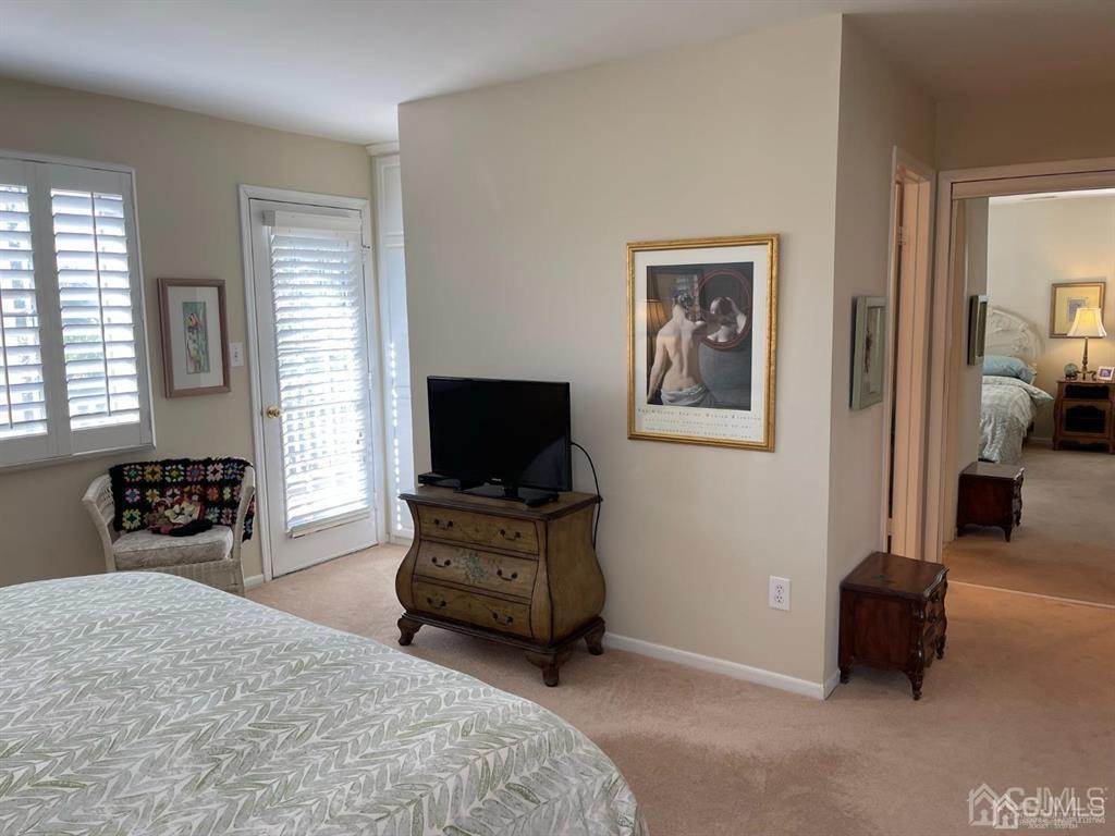 70 A Winthrop Road Monroe Township, NJ 08831 - Photo 28 of 50 a bedroom with furniture and a flat screen tv