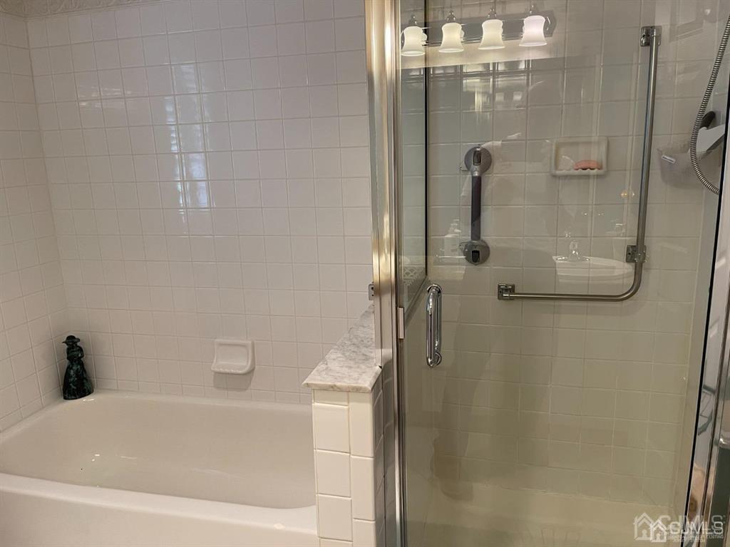 70 A Winthrop Road Monroe Township, NJ 08831 - Photo 33 of 50 a bathroom with a shower