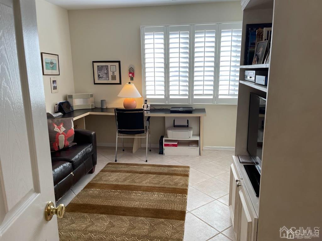 70 A Winthrop Road Monroe Township, NJ 08831 - Photo 39 of 50 a living room with furniture and a window