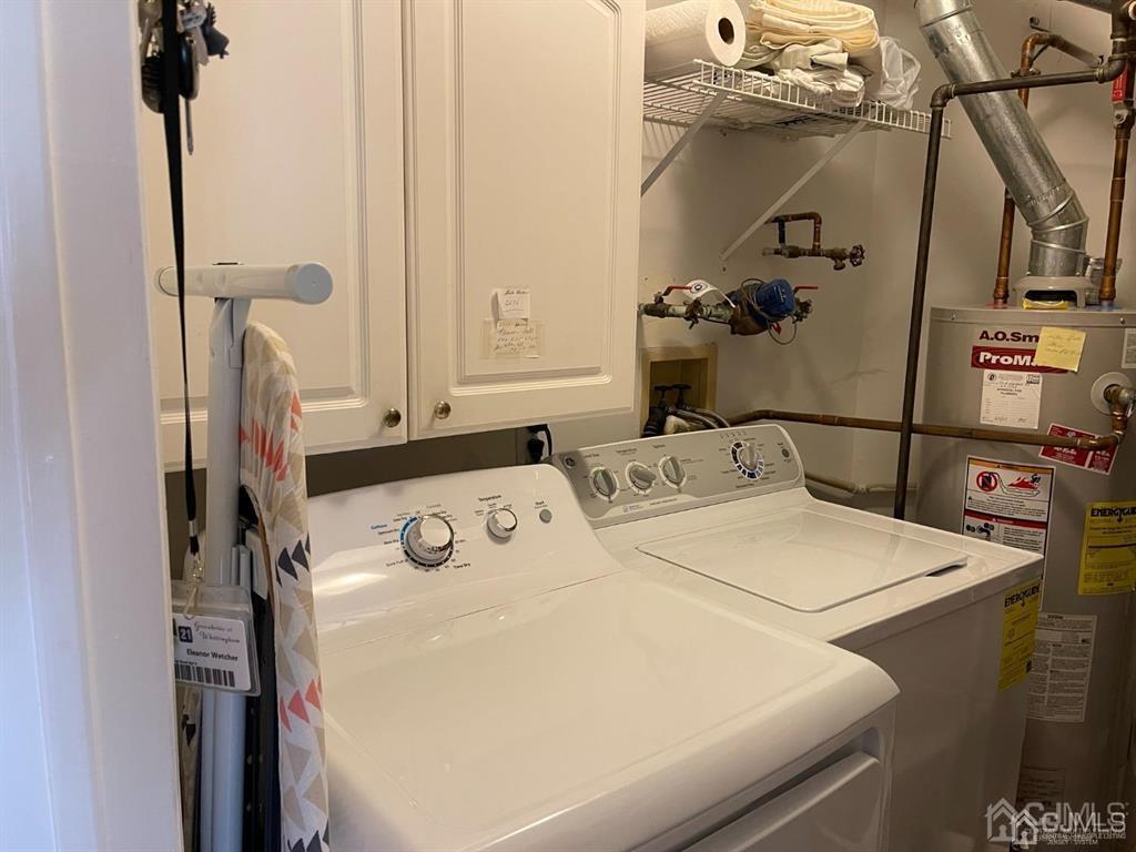 70 A Winthrop Road Monroe Township, NJ 08831 - Photo 44 of 50 a utility room with dryer and washer