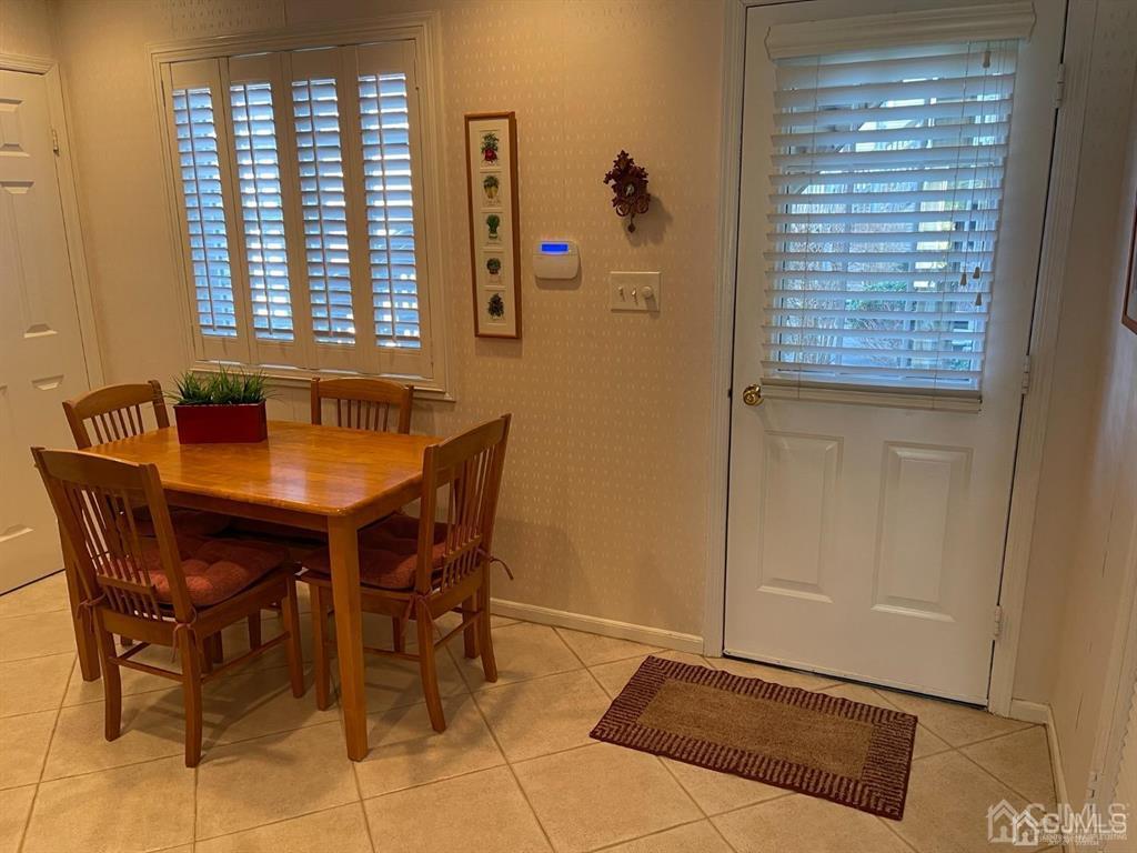 70 A Winthrop Road Monroe Township, NJ 08831 - Photo 45 of 50 a dining room with furniture and window