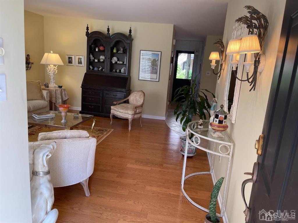 70 A Winthrop Road Monroe Township, NJ 08831 - Photo 7 of 50 a living room with furniture and wooden floor