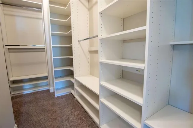 a view of a bathroom with wooden floor