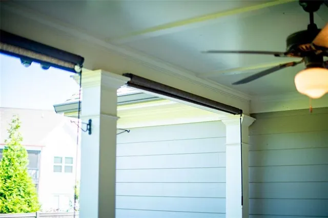 an aerial view of residential house with outdoor space and sitting area